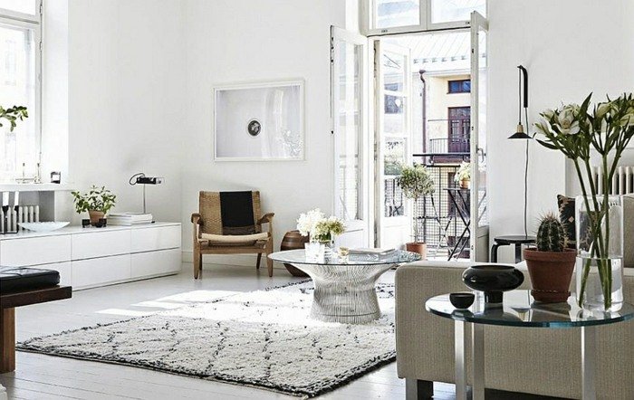 vardagsrum matta i skandinavisk stil svart vit skänk soffa