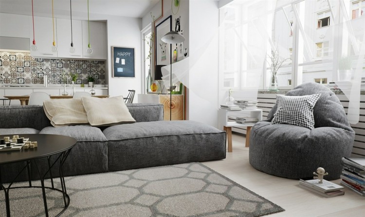 design-lägenhet-gråtoner-inredning-fåtölj-komfort-matta-bikakemönster