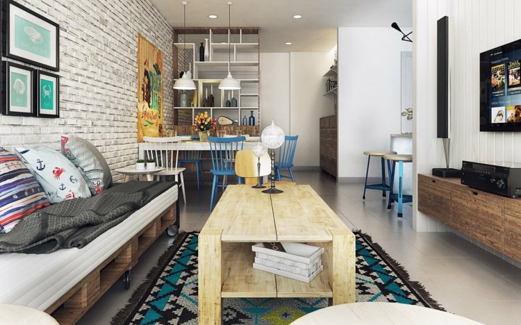 design-lägenhet-nautisk-nordisk-blå-accenter-ljus-trä-soffbord-pall-soffa