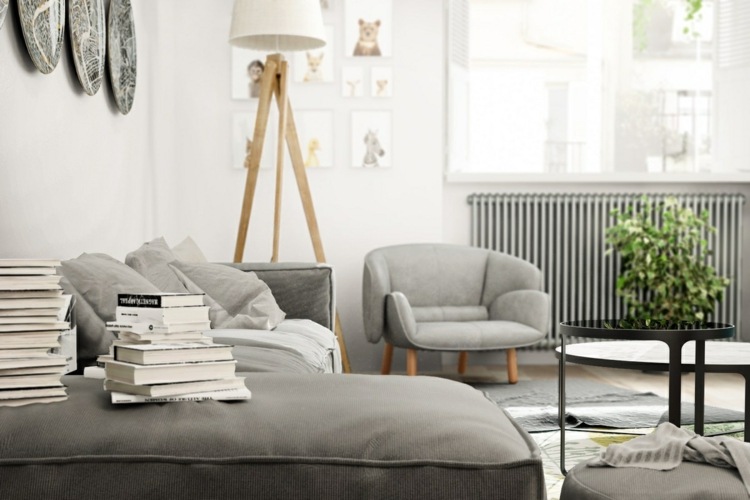 design-lägenhet-fåtölj-design-relax-vardagsrum-radiator-grå-golvlampa