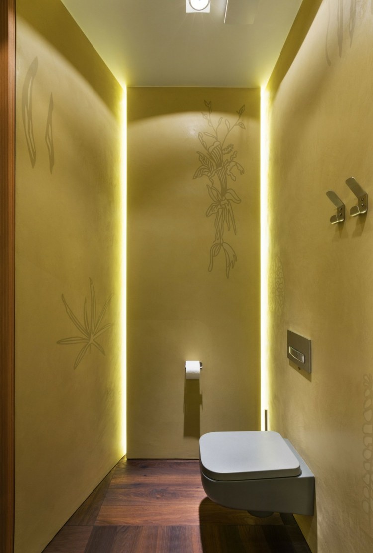 lägenhet gul grå interiör galgar toalett lampa parkett