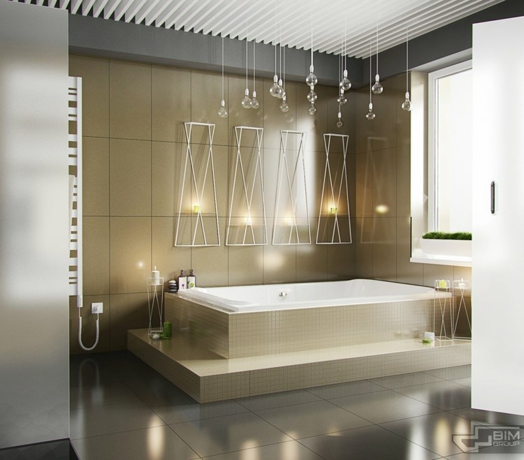 lägenhet med grå inredning kakel guld badkar elegant