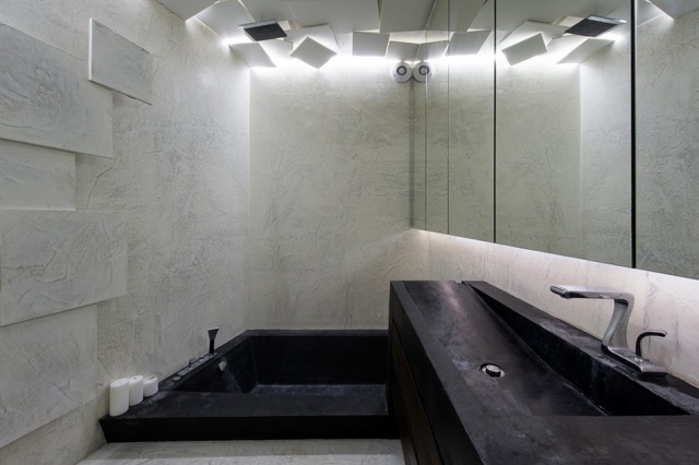 modernt badrum cementgips fåfänga ljuseffekter