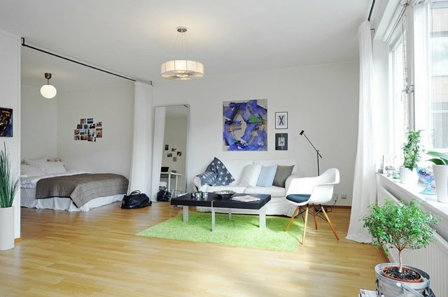 modern ett -rums lägenhet - sovrum åtskilda av gardiner