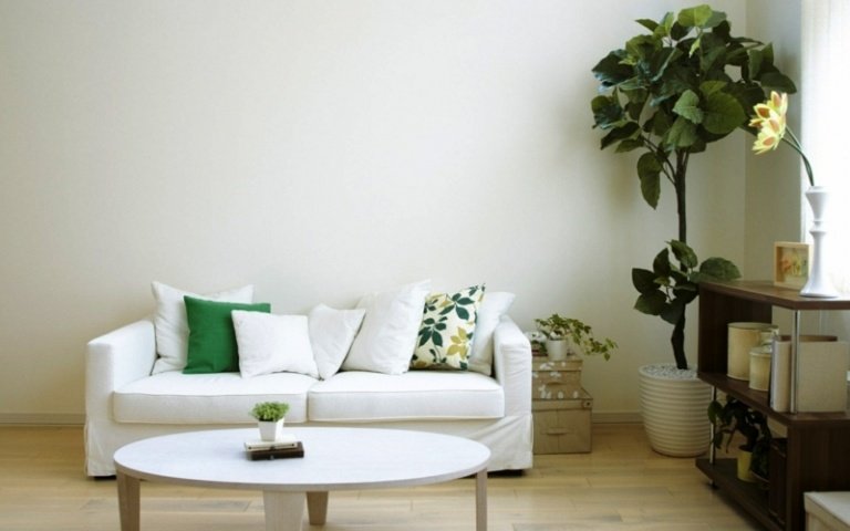dekorera vardagsrummet enkelt modernt inredning grön vit växt