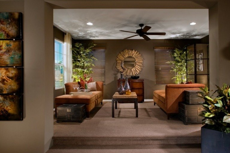 dekorera vardagsrum bambu växter exotisk stil orange möbler