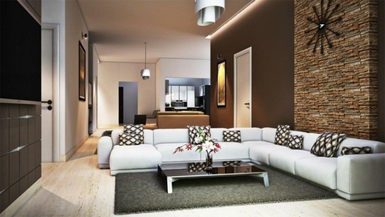 dekorera vardagsrum mönster kudde soffa grå matta accent vägg tegel
