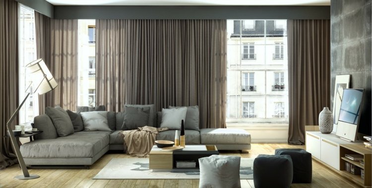 vardagsrum-gardiner-grå-soffa-trägolv-betong utseende-väggbeklädnad