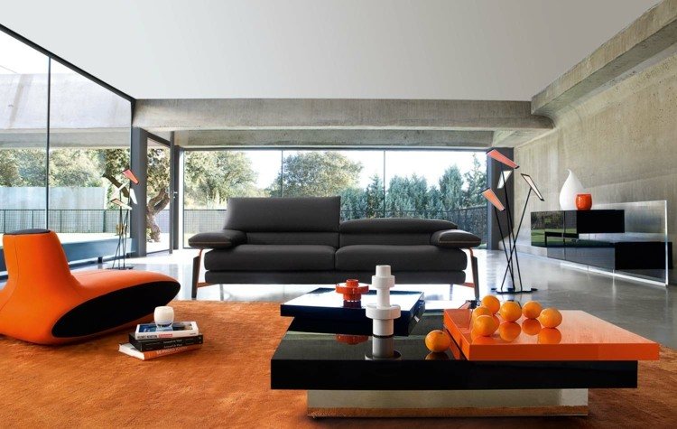 vardagsrumsidéer för svart soffa orange-kombinerande-möblering-inspiration