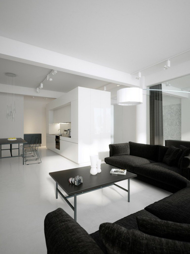 vardagsrum-idéer-svart-soffa-vit-interiör-kök-metall-bord