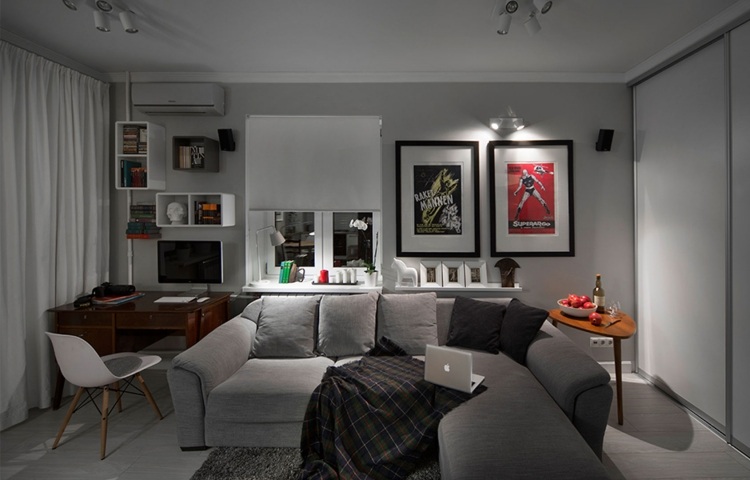Vardagsrum i gråhörnsoffa-affischer-moderna-ungdomliga-skrivbord-dekorationshyllor