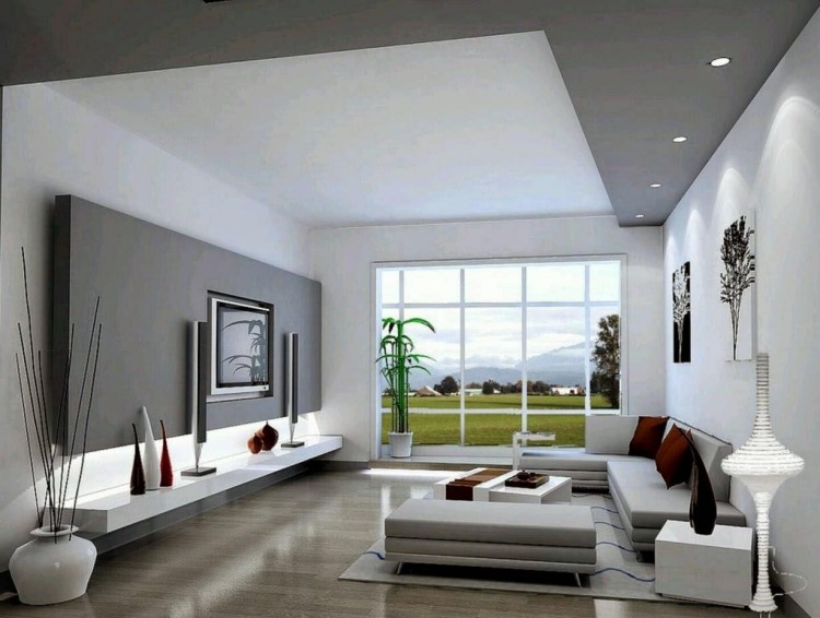 vardagsrum-grå-hörn-soffa-terrass-fönster-modern-vit-tv-vägg-deco-matta-kuddar