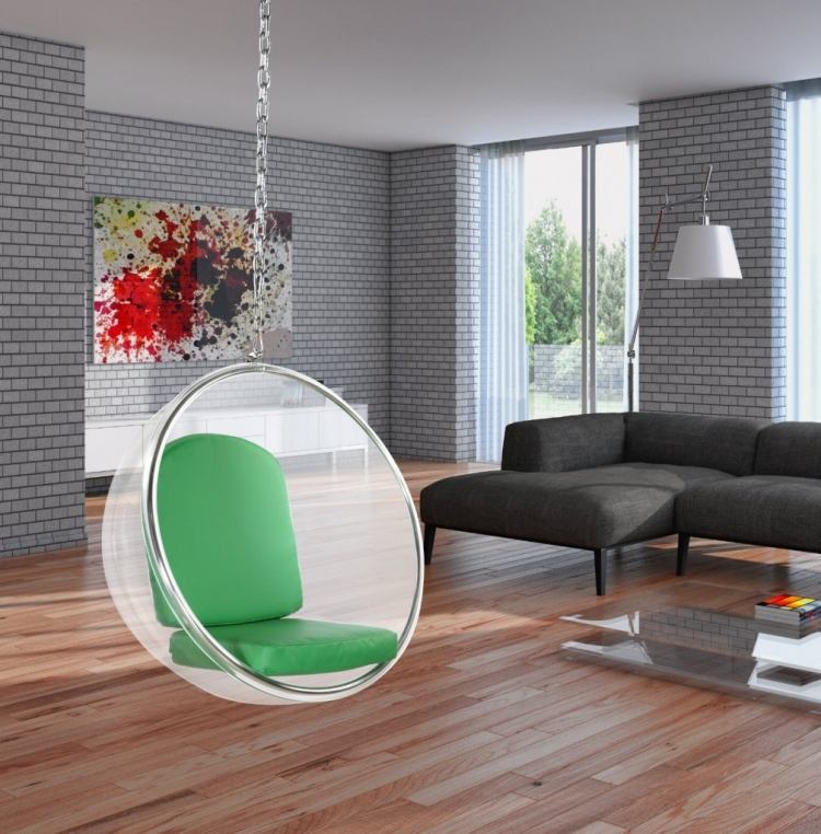 vardagsrum-grå-hörn-soffa-hängande-stol-tegel-vägg-bild-abstrakt-konst-soffbord-glas-laminat-golv