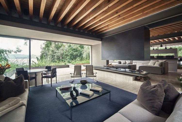 Vardagsrum-grå-öppen spis-tak-trä-modern design
