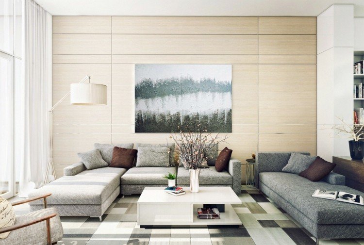 modernt vardagsrum inredning grå nyanser soffor bild matta geometriska