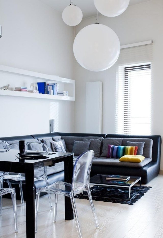 modernt vardagsrum-hörn-soffa-stort-läder-svart