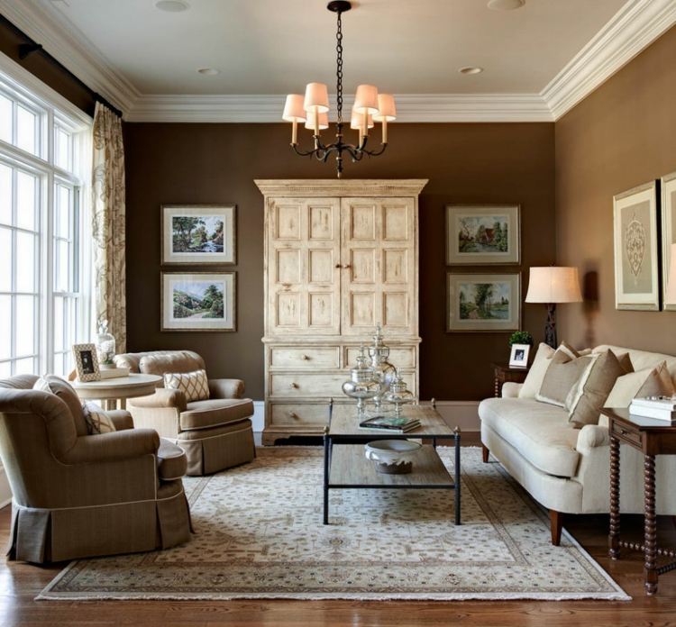 vardagsrum väggfärger 2015 brun varm atmosfär garderob soffa fåtölj