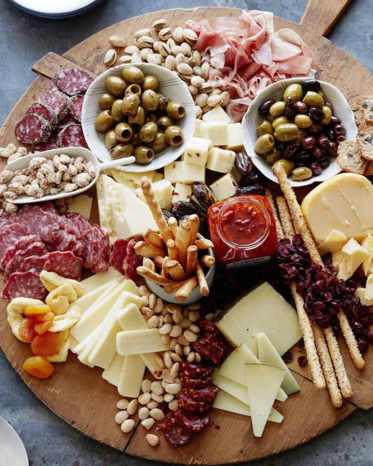 aperitif bitar tandpetare ost tallrik servering idéer