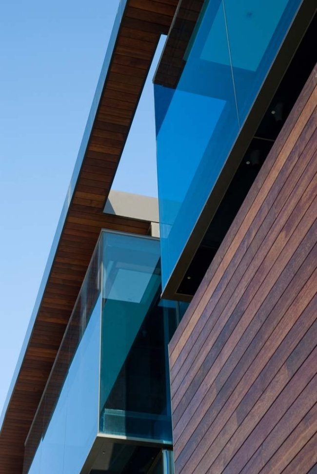 Studio 9one2-modernt hus-massivt trä fasad design trä