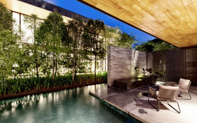 fristående hus modern inredning pool granitgolv